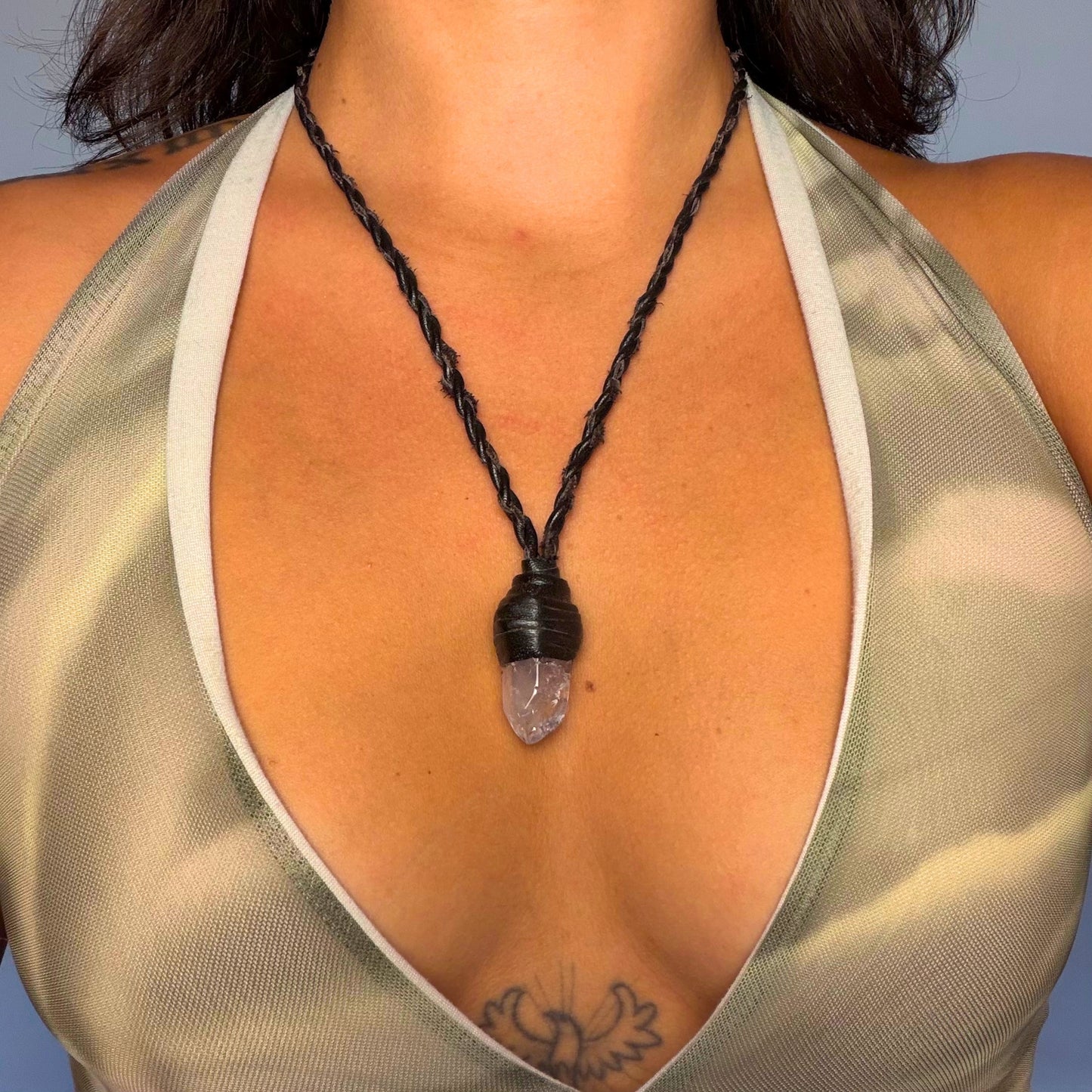 Wrapped Milky Quartz crystal talisman worn